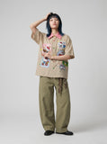 DAXUEN Short-sleeved plaid button-up shirt with cartoon cat patches — model photo