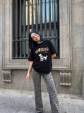 DAXUEN black oversized cartoon dog graphic t-shirt — model photo