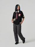 DAXUEN Relaxed-fit short-sleeved polo shirt with cartoon embroidery — model photo