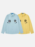 DAXUEN light blue polka dot shirt with cartoon eye graphics