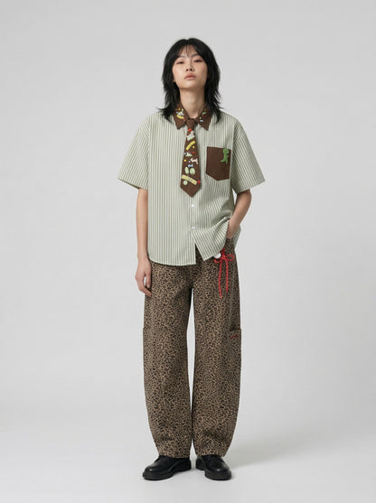 DAXUEN Short-sleeved button-up shirt with cartoon graphics — model photo