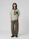 DAXUEN Short-sleeved button-up shirt with cartoon graphics — model photo
