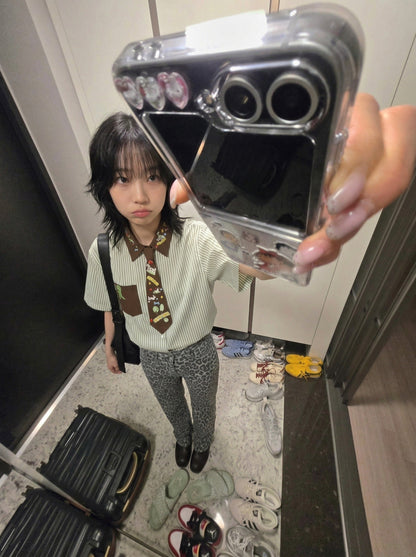 DAXUEN Short-sleeved button-up shirt with cartoon graphics — model photo