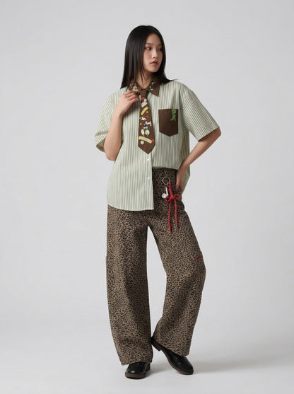 DAXUEN Short-sleeved button-up shirt with cartoon graphics — model photo