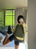 DAXUEN Hooded sweater with cartoon graphics and contrasting sleeves — model photo