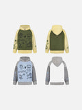 DAXUEN Hooded sweater with cartoon graphics and contrasting sleeves