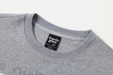 DAXUEN grey cartoon guitarist layered long-sleeve top