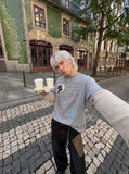 DAXUEN grey cartoon guitarist layered long-sleeve top — model photo
