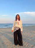 DAXUEN light grey oversized cartoon sun graphic long-sleeve crew top — model photo
