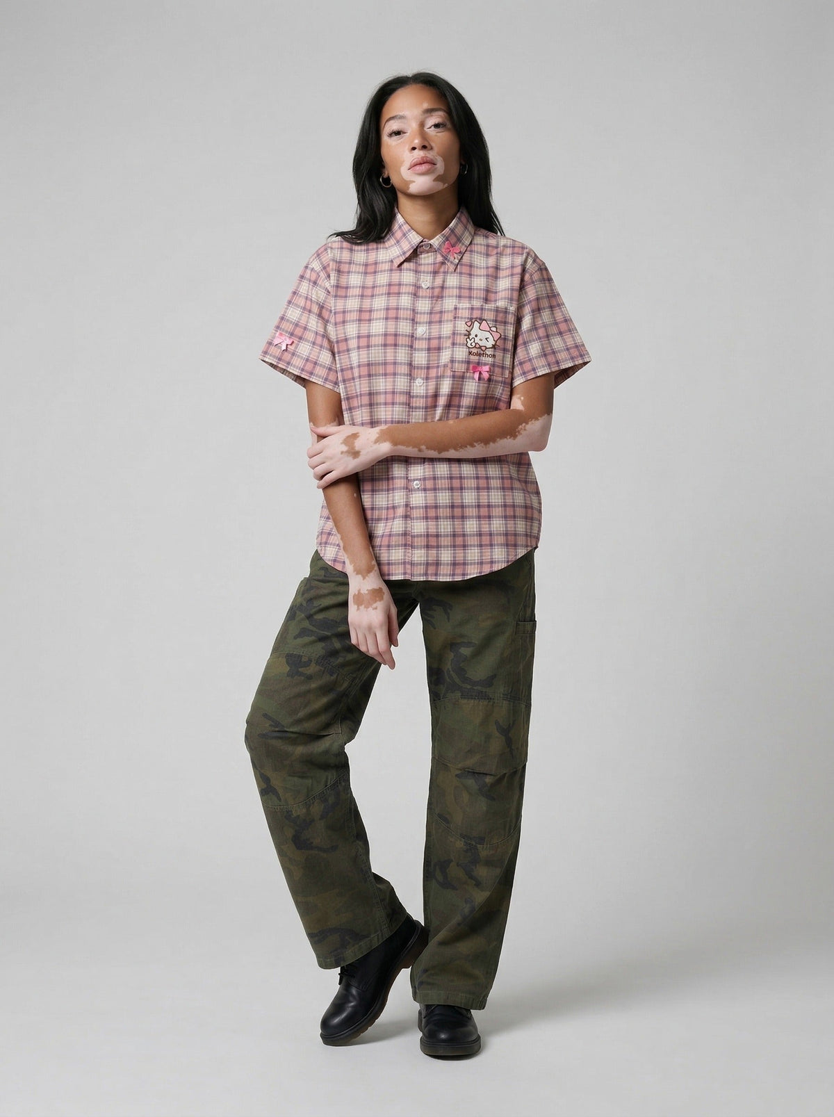 DAXUEN Casual pink plaid button-up shirt with cartoon embroidery — model photo
