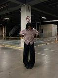 DAXUEN Casual pink plaid button-up shirt with cartoon embroidery — model photo