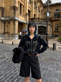 DAXUEN Knee-length casual shorts with rivet pockets — model photo