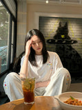 DAXUEN Women's casual wide-leg sweatpants in various styles — model photo