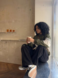 DAXUEN Wide-leg sweatpants in black and heathered light grey — model photo