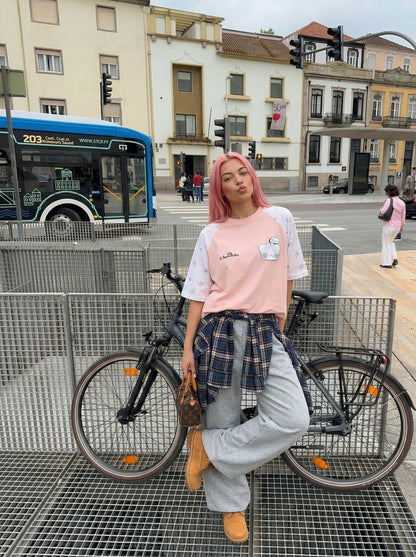 DAXUEN Oversized T-shirt with cat graphic and polka dot sleeves — model photo