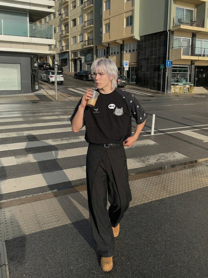 DAXUEN Oversized T-shirt with cat graphic and polka dot sleeves — model photo