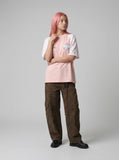 DAXUEN Oversized T-shirt with cat graphic and polka dot sleeves — model photo