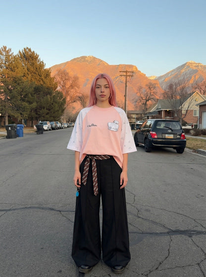 DAXUEN Oversized T-shirt with cat graphic and polka dot sleeves — model photo