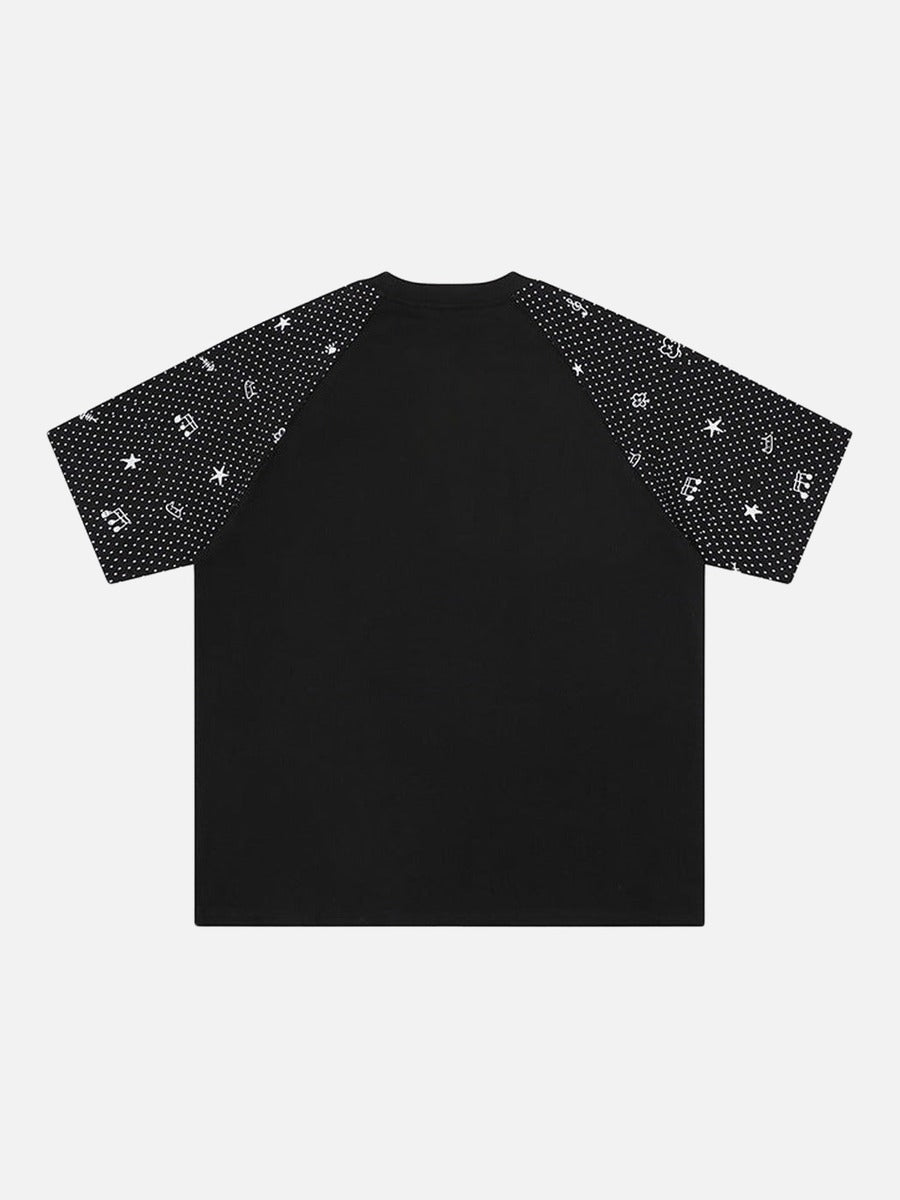 DAXUEN Oversized T-shirt with cat graphic and polka dot sleeves