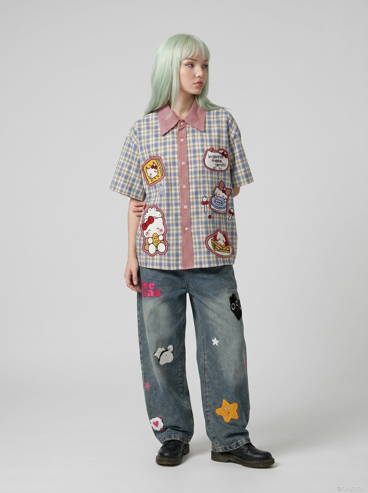DAXUEN Plaid button-up shirt with cartoon cat patches — model photo