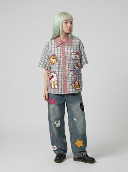 DAXUEN Plaid button-up shirt with cartoon cat patches — model photo