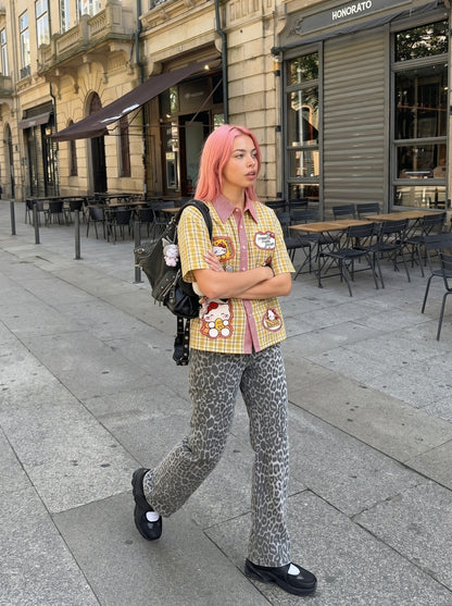DAXUEN Plaid button-up shirt with cartoon cat patches — model photo