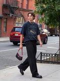 DAXUEN Oversized short-sleeve t-shirt with a celestial graphic — model photo