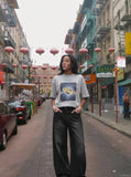 DAXUEN Oversized short-sleeve t-shirt with a celestial graphic — model photo