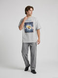 DAXUEN Oversized short-sleeve t-shirt with a celestial graphic — model photo