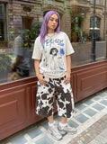DAXUEN Light cream graphic T-shirt with chaotic print — model photo