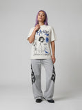 DAXUEN Light cream graphic T-shirt with chaotic print — model photo
