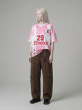 DAXUEN Loose-fitting V-neck jersey top with graphics — model photo