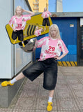 DAXUEN Loose-fitting V-neck jersey top with graphics — model photo