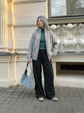 DAXUEN Women's black pinstripe wide-leg pants — model photo