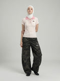 DAXUEN Short-sleeved women's polo shirt with lace-up front — model photo