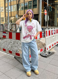 DAXUEN Chill oversized t-shirt with anime character graphic — model photo