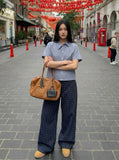 DAXUEN Short-sleeved blue and white check button-up shirt — model photo