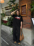 DAXUEN Chill Cat Graphic T-Shirt — model photo