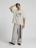 DAXUEN Oversized t-shirt with a dog graphic print — model photo