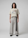 DAXUEN Oversized t-shirt with a dog graphic print — model photo
