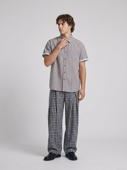 DAXUEN Short-sleeved grey striped button-up shirt — model photo