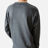 DAXUEN Relaxed-fit long sleeve top with half-zip neckline — model photo