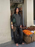DAXUEN Relaxed-fit long sleeve top with half-zip neckline — model photo