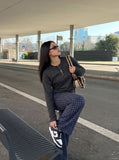 DAXUEN Relaxed-fit long sleeve top with half-zip neckline — model photo