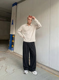 DAXUEN Half-zip polo long sleeve t-shirt in beige and grey — model photo