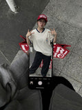 DAXUEN Short-sleeved henley-style T-shirt with graphic pocket — model photo