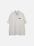 DAXUEN Light grey oversized polo shirt with red embroidery