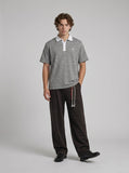 DAXUEN Short-sleeved polo shirt with horizontal stripes — model photo