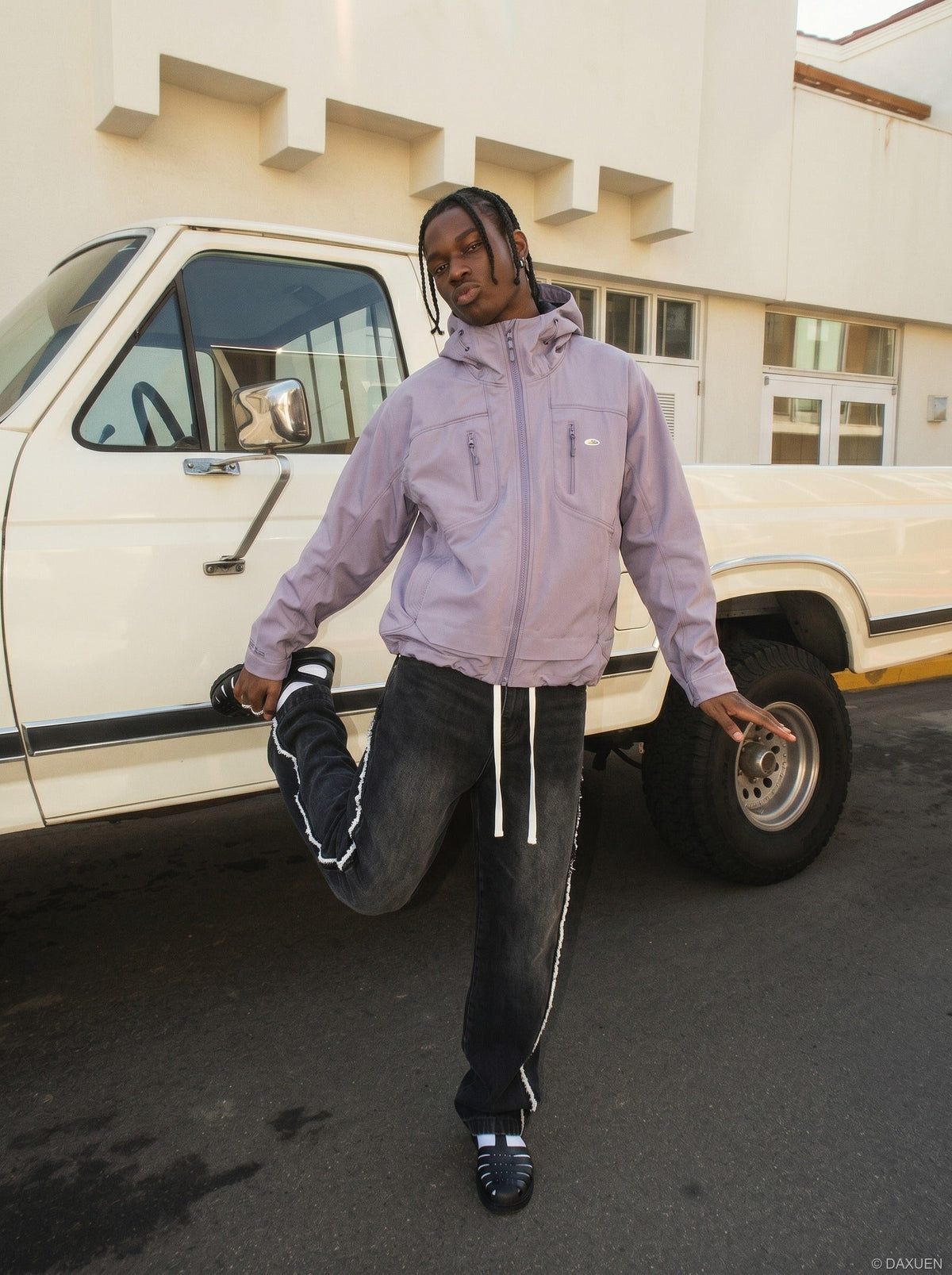 DAXUEN Oversized hooded technical jacket — model photo