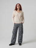 DAXUEN Long sleeve hooded top in light beige crochet fabric — model photo
